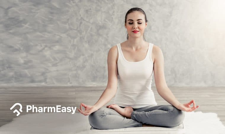 Sukhasana: Easy Pose Benefits & How-To by Dr. Himani Bisht