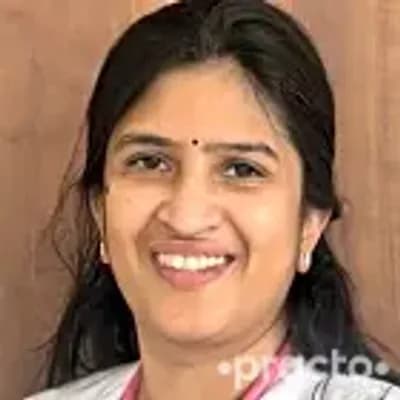 Dr. Asha MB