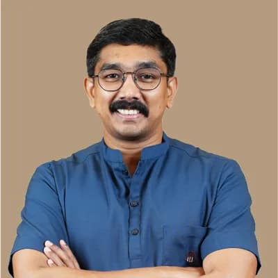 Dr. Nikhil K V
